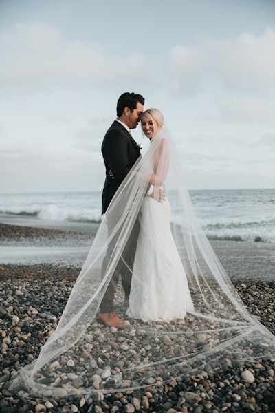 Jason and Priya celebrating their romantic engagement outdoors